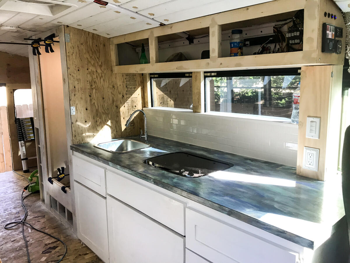 Completed Lower Half and in Progress Upper Cabinets