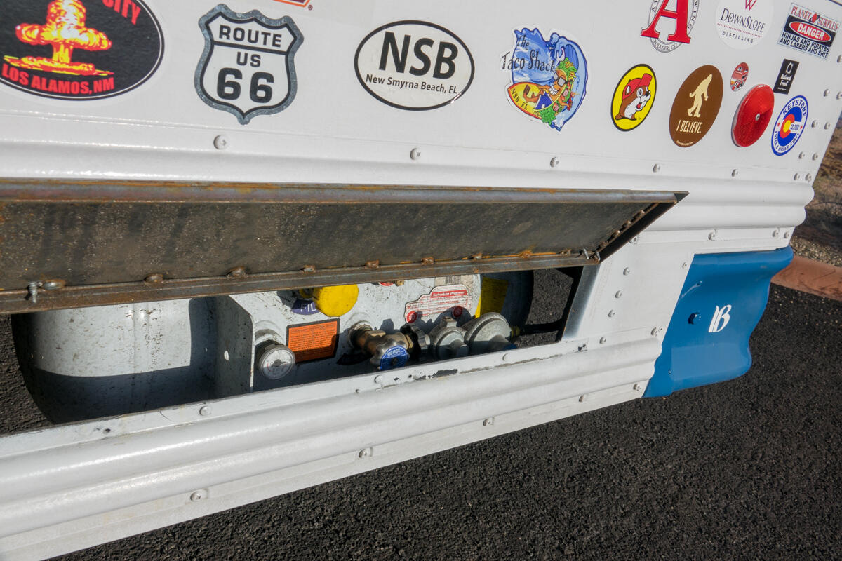 The Horizontal Tank Mounted Under the Bus Seen Through the Access Panel